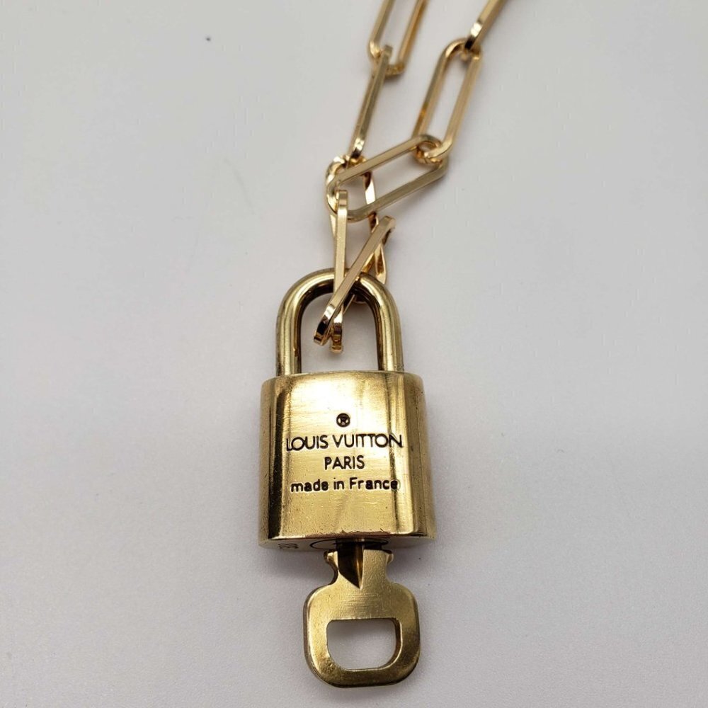 Authentic Louis Vuitton Lock and Key Gold Color with Gold Plated Chain Necklace - Picture 2 of 8